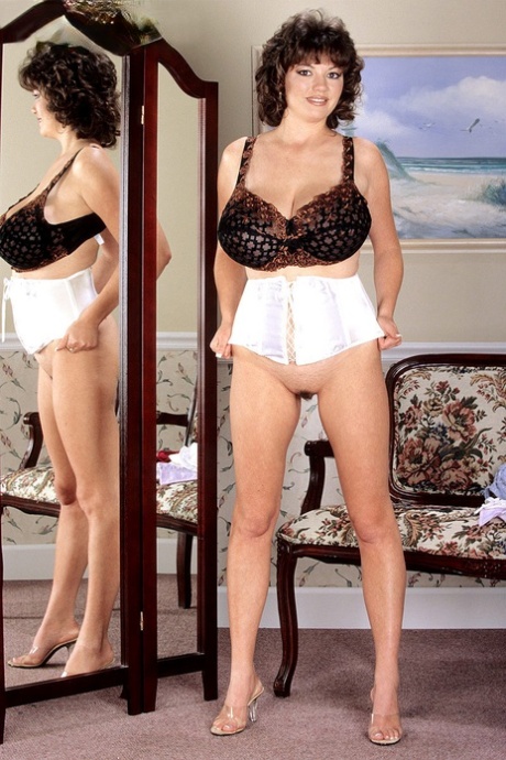 Busty vintage mom Diane Poppo exposes her melons and tasty love holes
