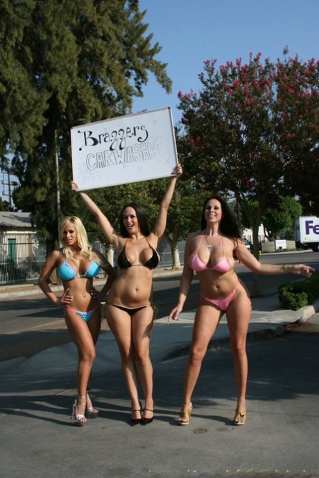 3 busty chicks in bikinis bang a big dick while working at the car wash
