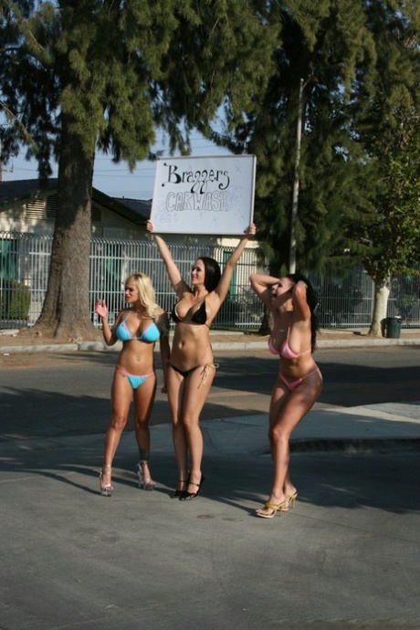 3 busty chicks in bikinis bang a big dick while working at the car wash