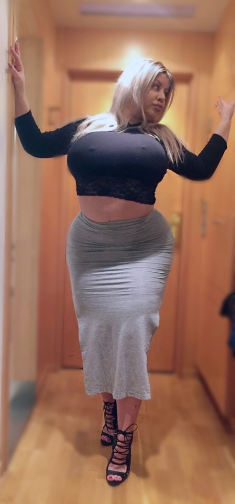 Blonde MILF Natasha Crown shows off her monster bubble booty in her sexy skirt