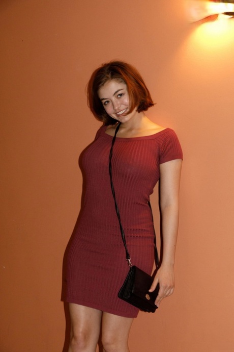 Lovely redhead Aria Sky shows her hot ass & her beautiful natural tits